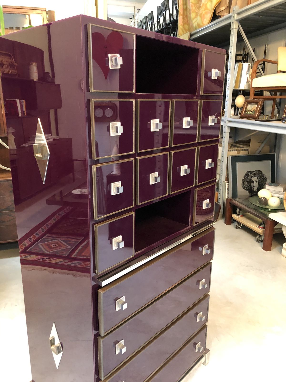 Burgundy lacquer cabinet with many small drawers